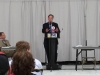 Marty McClendon speaks to the congressional caucus
